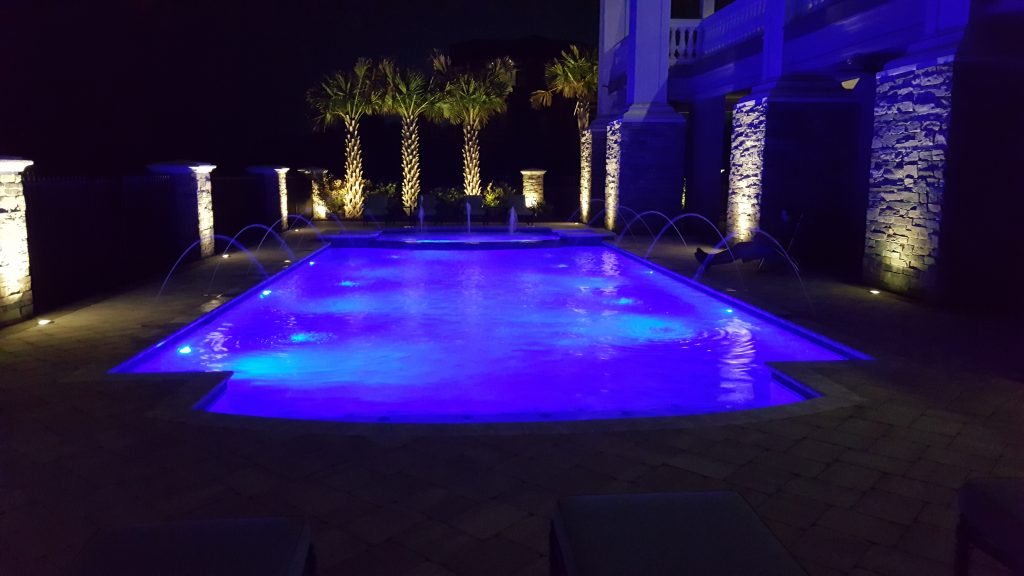 myrtle beach pool builder contractor myrtle beach swimming pool spa travertine waterfall water feature fountain blue pool sun shelf custom