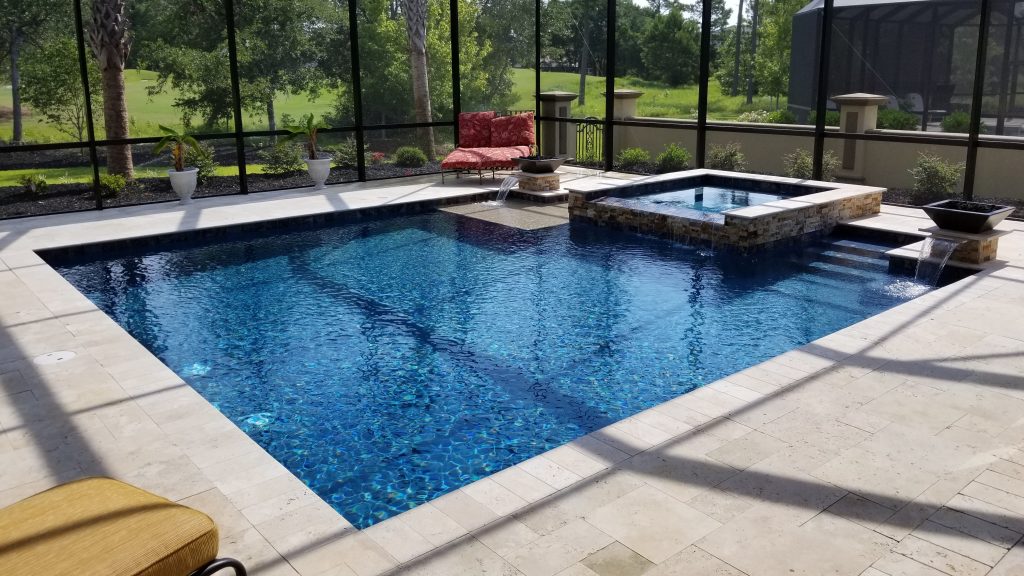 myrtle beach pool builder contractor myrtle beach swimming pool spa travertine waterfall water feature fountain blue pool sun shelf custom