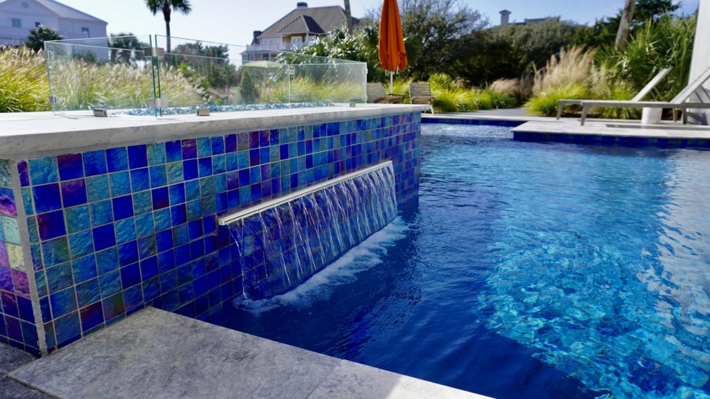 myrtle beach pool builder contractor myrtle beach swimming pool spa travertine waterfall water feature fountain blue pool sun shelf custom